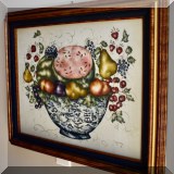A05. Framed bowl of fruit theorem painting by Maura Campbell. 21” x 25” - $85 